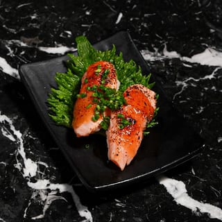Black Shichimi Aburi Nigiris